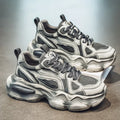 Men's black mesh casual sneakers with cross-strap detail and a platform rubber sole.