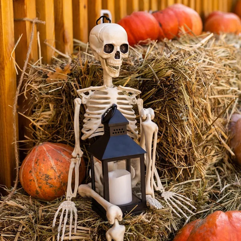 90cm tall white plastic Halloween skeleton with movable joints posed standing.