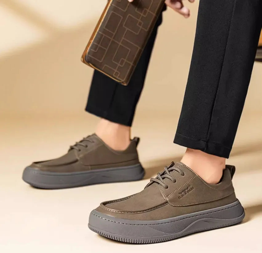 Men's brown retro-style leather casual shoes with a big toe design and visible stitching.