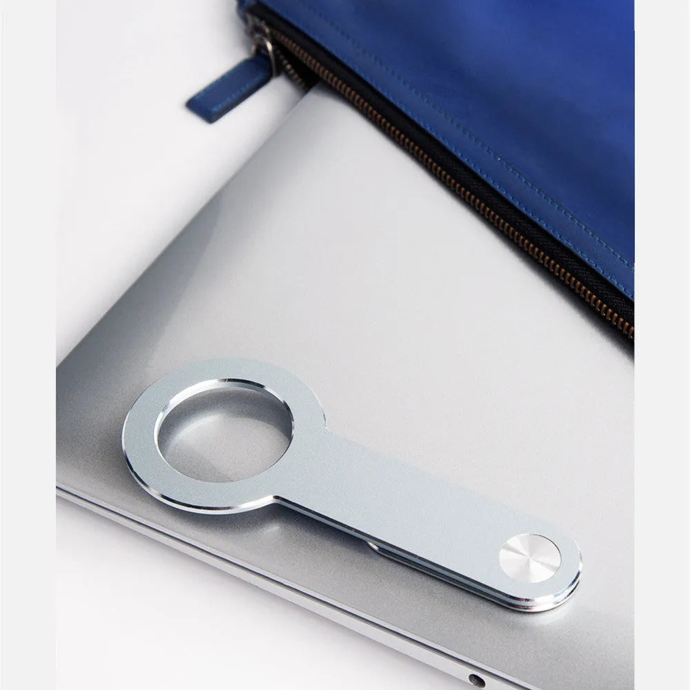 Metallic silver aluminium alloy desktop phone holder with magnetic extension for iPhone.