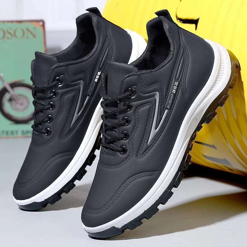 Black and red waterproof leisure shoes with soft plastic sole and lace-up front