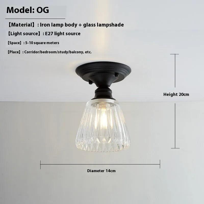 American retro style single-head ceiling or wall lamp with a glass cover.