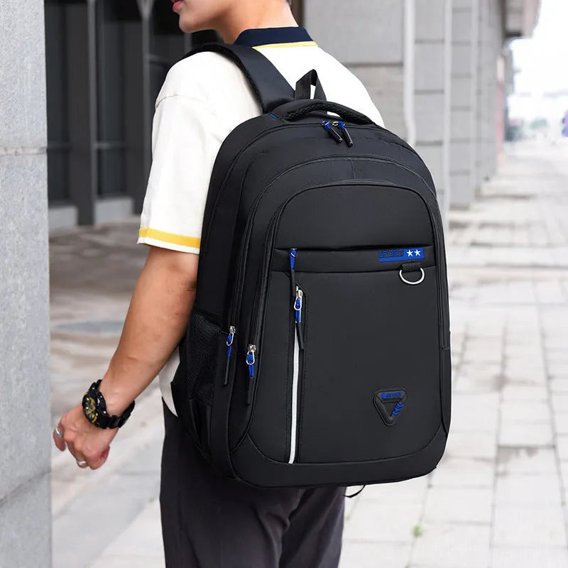 Men's Oxford cloth schoolbag with letters pattern in multiple colour options showing air pillow belt system
