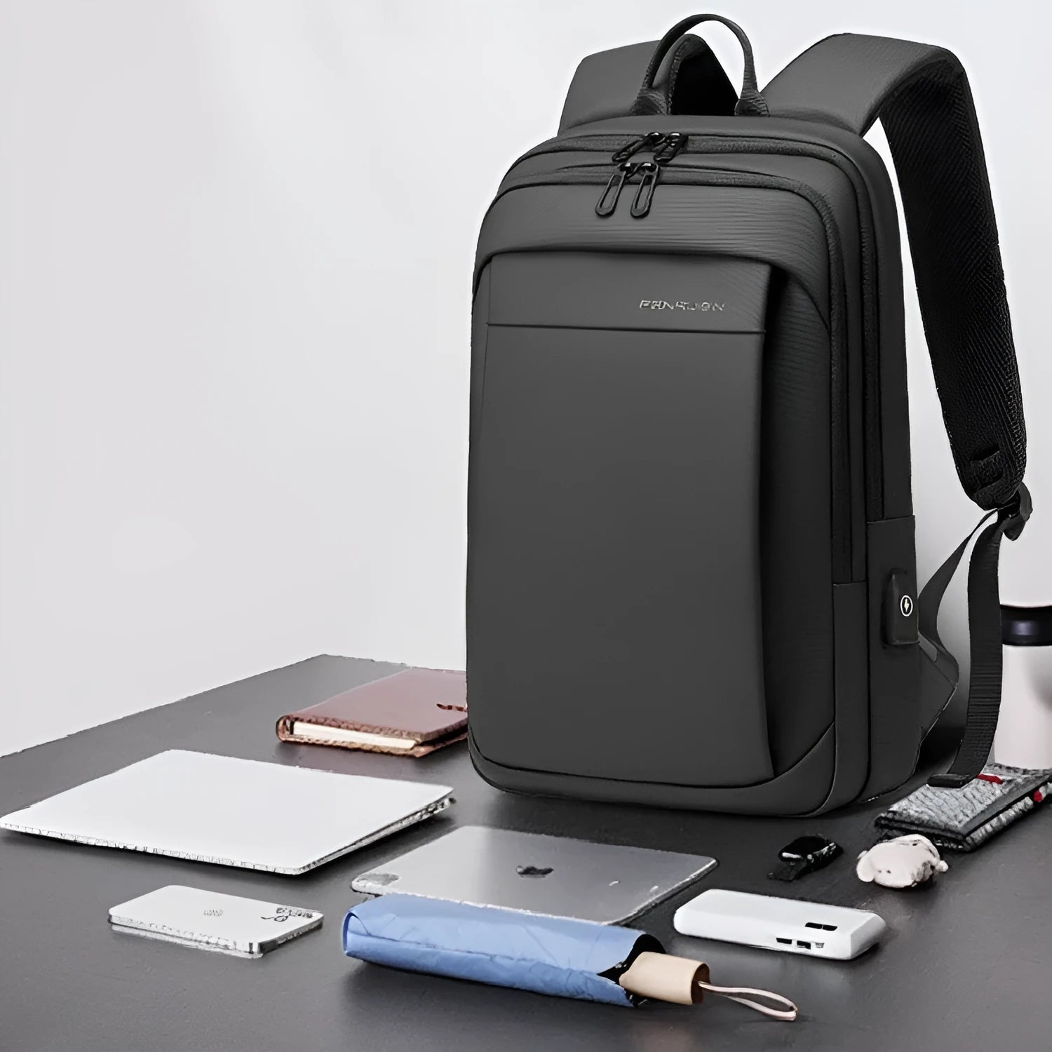 Large capacity Oxford cloth backpack for commuting and travel in black with 16-inch laptop compartment and air cushion strap