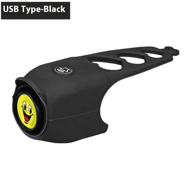 Black electronic bicycle horn with button, mounted on a bicycle handlebar.