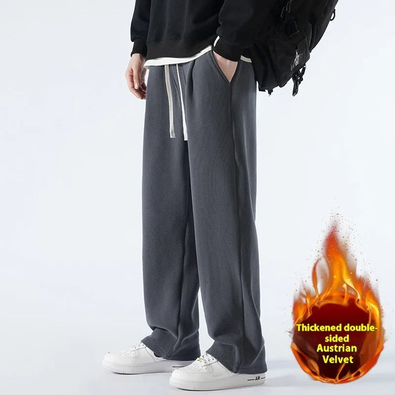 Men's apricot coloured double-sided polar fleece winter pants with a loose fit and drawstring waist.