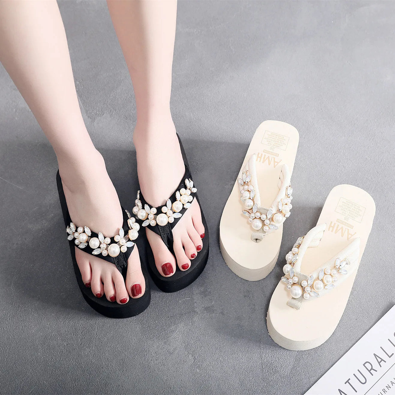 Women's beige high-heeled flip-flop sandals with cotton cloth upper on a light background.
