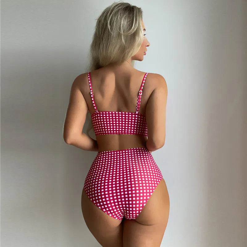 Women's plaid bikini swimsuit with high-waisted briefs in rose red, on a mannequin.