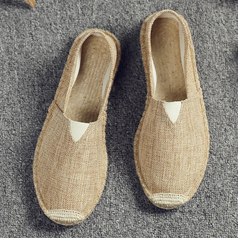 Men's solid colour canvas casual shoes with round toe in light brown.