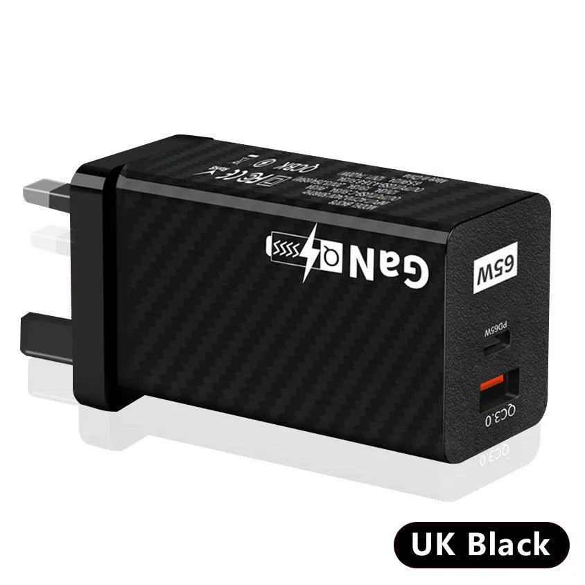 White and black 65W GaN USB-C laptop travel charger with UK, US, and EU plug options