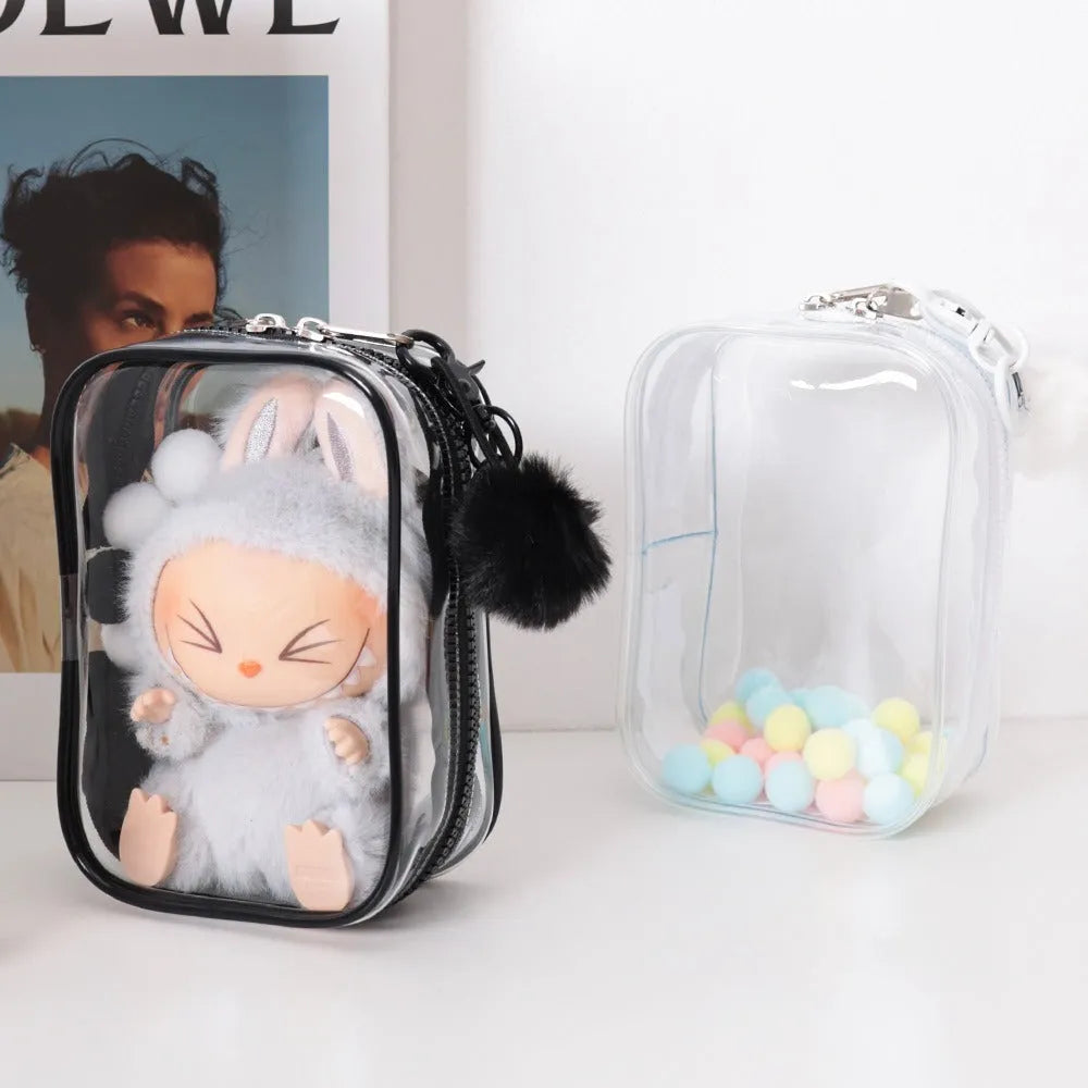 Set of three semi-transparent PVC makeup bags in black, pink, and white colours with handles