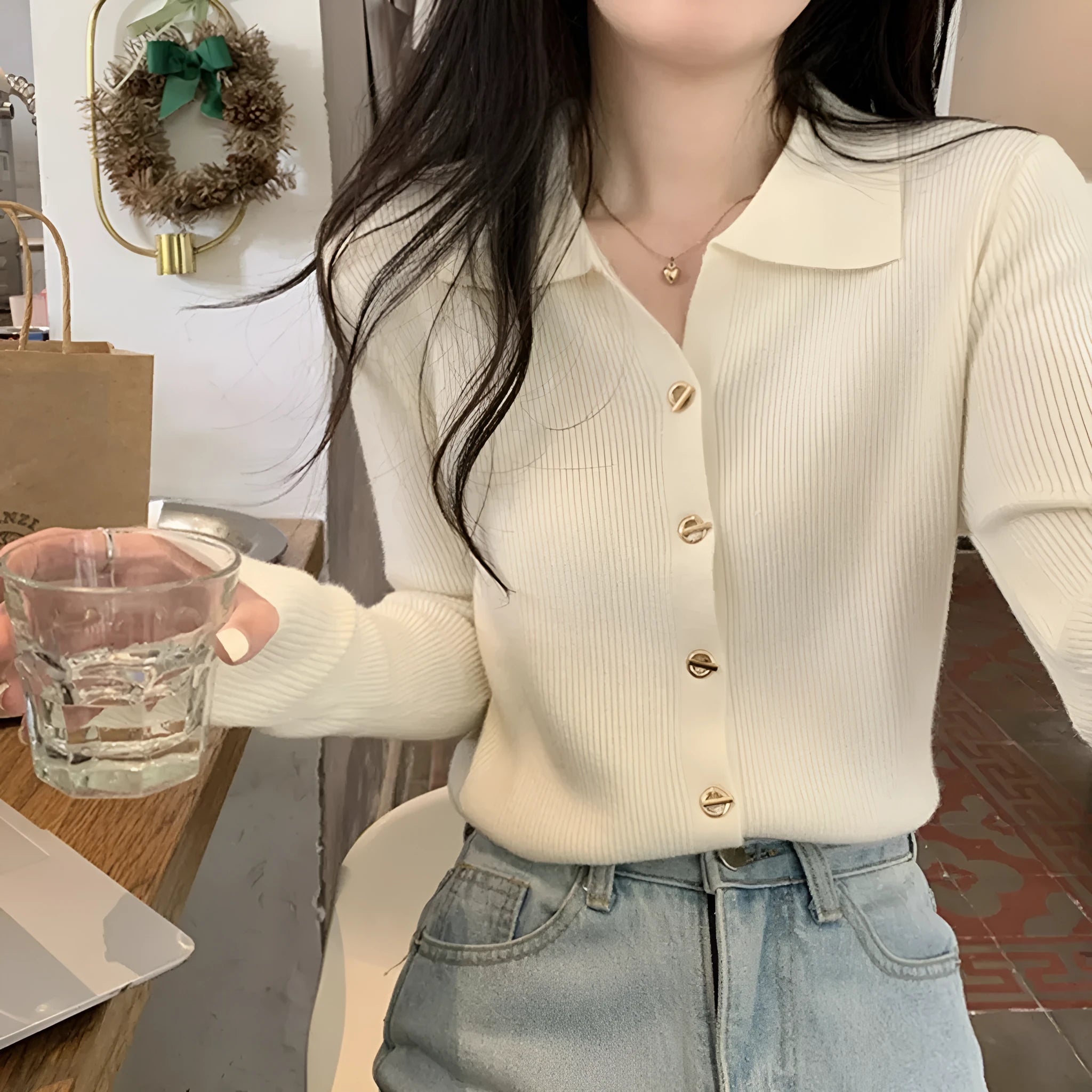 Women's loose fit long-sleeved knitted cardigan in viscose fibre, shown in beige colour