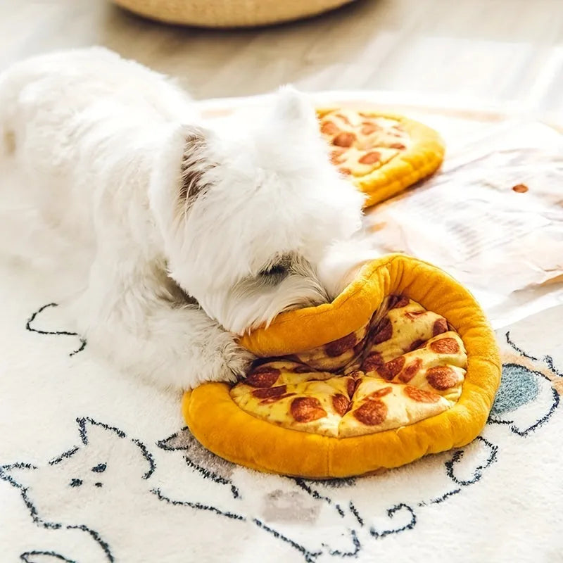 Yellow rubber pizza-shaped dog chew toy with squeaker for interactive play.