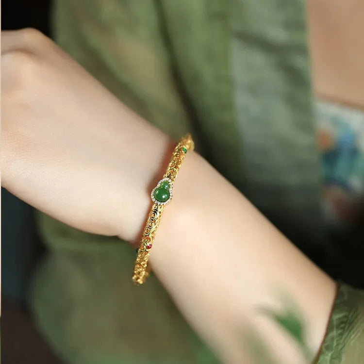 Gold-plated copper xiangyun gourd bracelet with adjustable silk cord for women