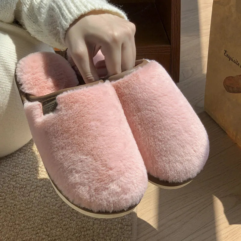 A pair of solid-colour winter plush slippers with a non-slip PVC sole, shown in a selection of available colours.