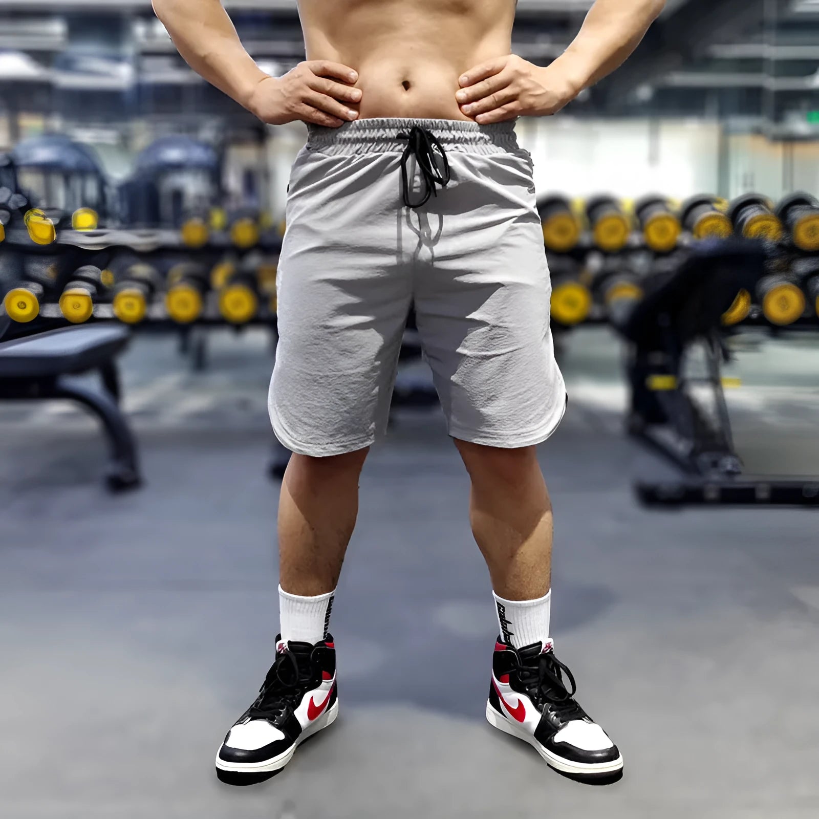 Men's black quick-drying running shorts made of thin polyamide-spandex fabric for sports.