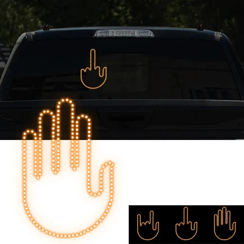 Black LED gesture car light with amber illumination showing hand gesture, remote control, and 3M Velcro mounting