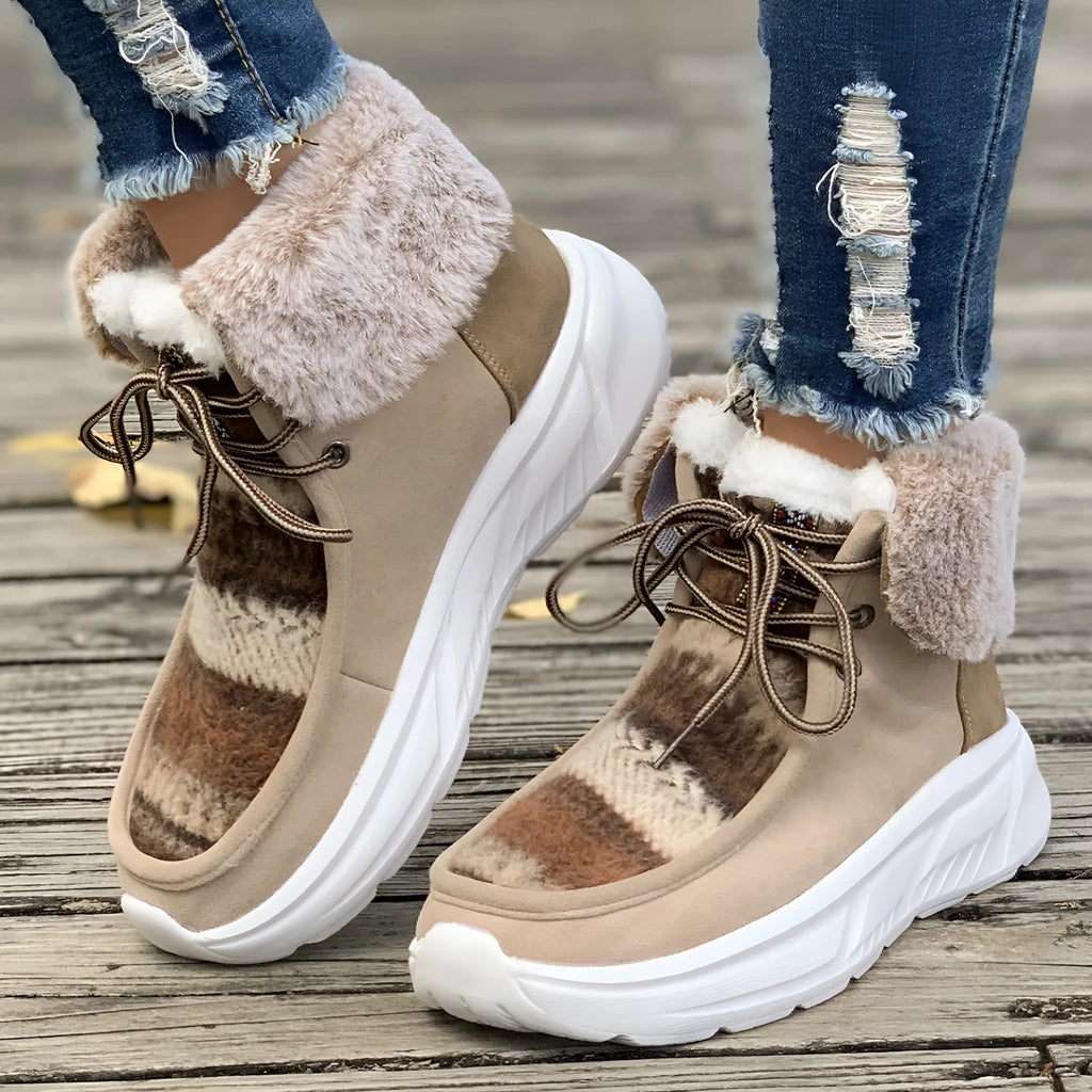 Women's beige suede lace-up snow boots with thick rubber soles and plush lining