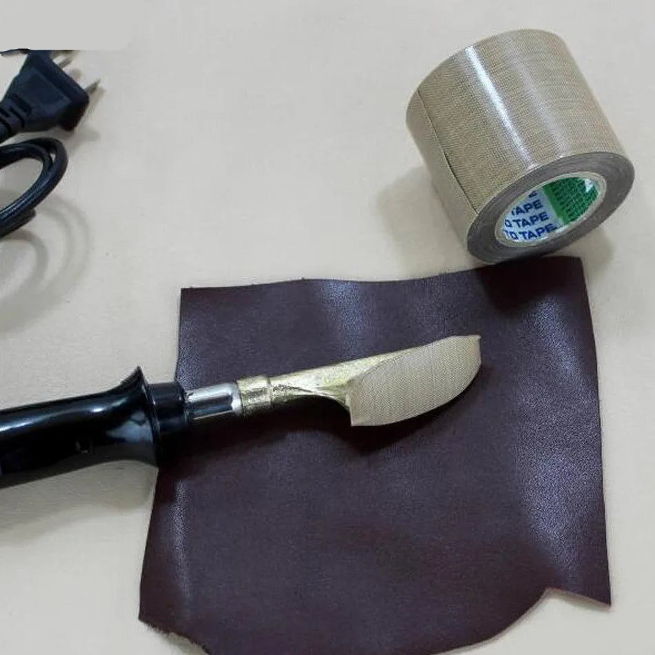 Black ABS wrinkle grinding and heating tool on a workbench