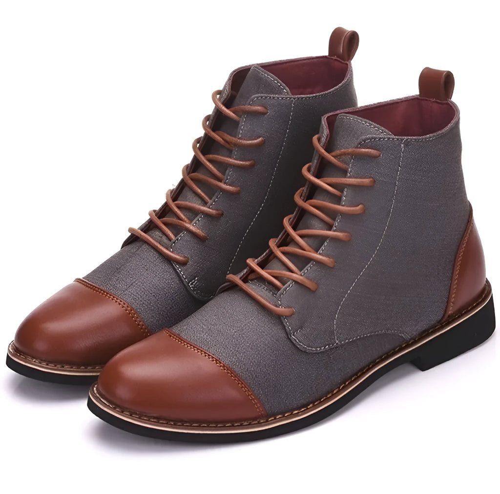 Men's black leather motorcycle boots with silver buckle detailing on the side.