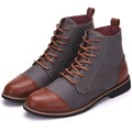 Men's black leather motorcycle boots with silver buckle detailing on the side.
