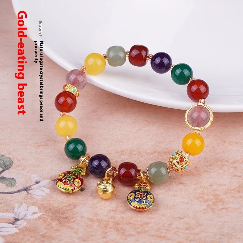 Swallowing Gold Beast agate bracelet with 10mm beads and hand-woven construction