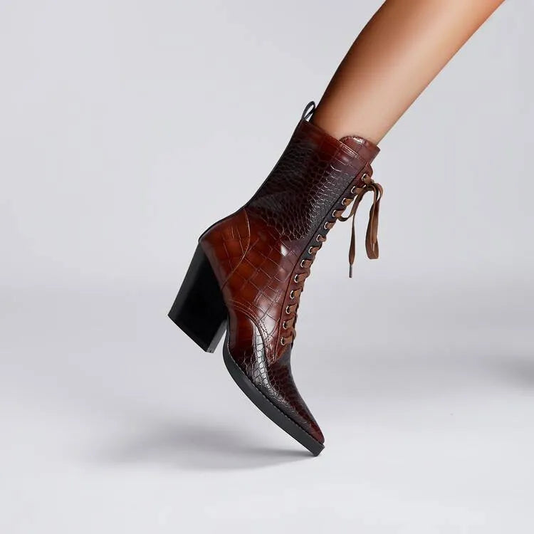 Dark brown women's pointed toe boots with chunky heel and side zip.