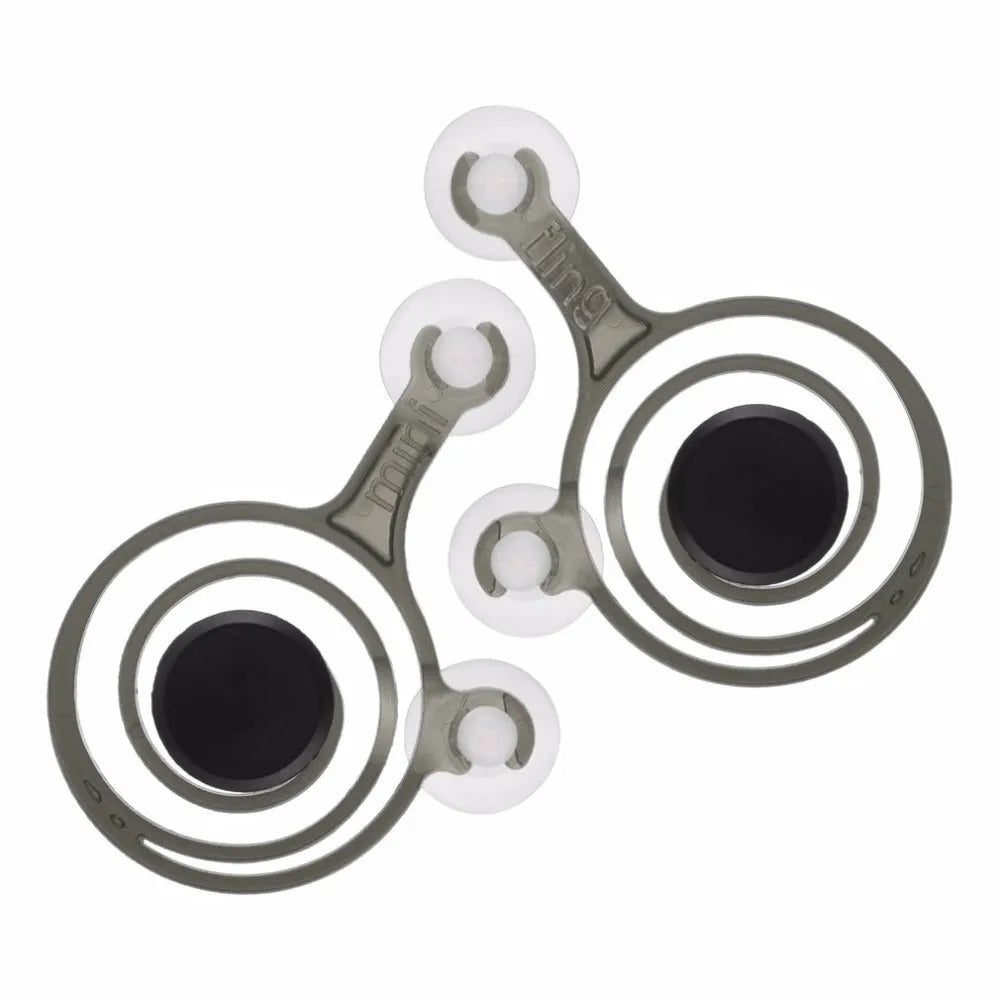 Clear and black universal mini joystick for mobile phone touch screen gaming.