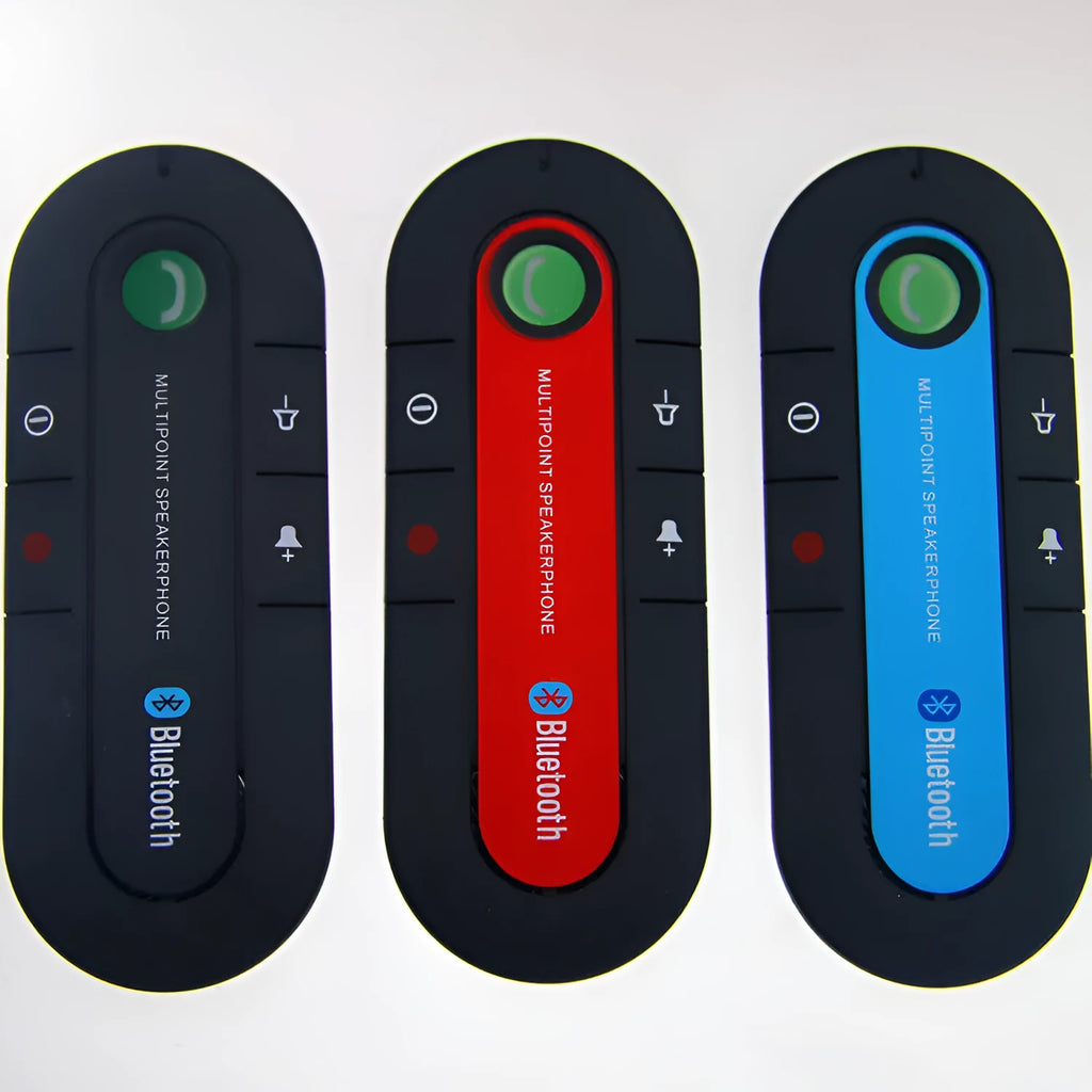 Black car Bluetooth handsfree kit clipped to a sun visor, showing the speaker grille and included car charger.