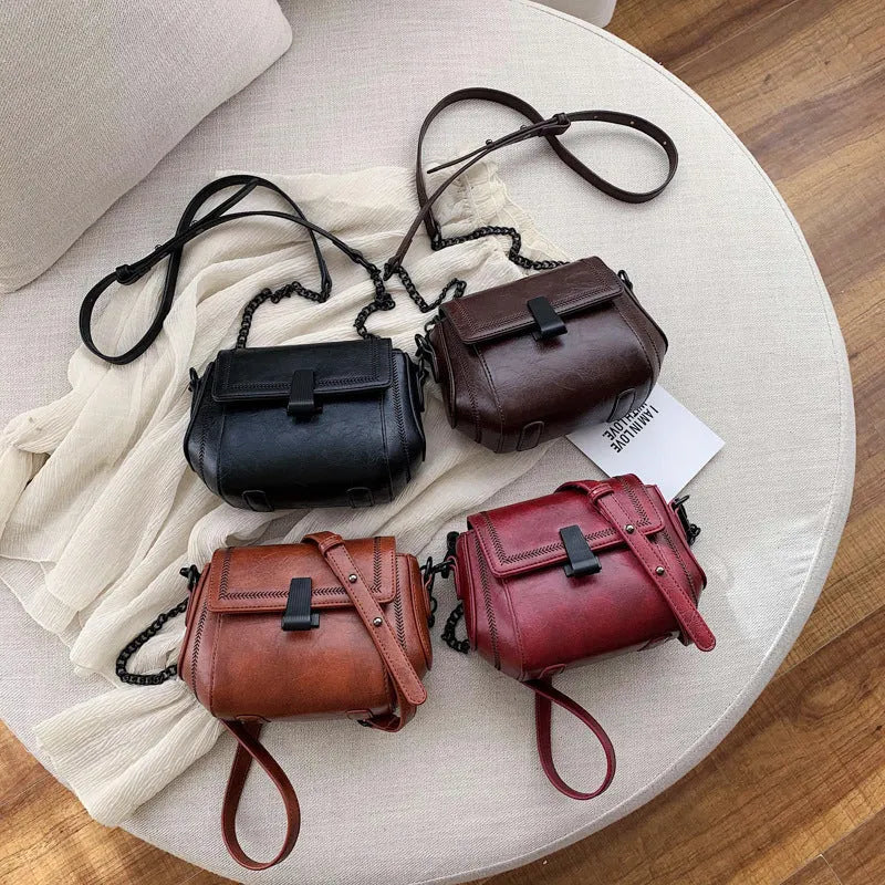 Korean style PU shoulder crossbody bag in beige with clamshell opening and crossbody strap