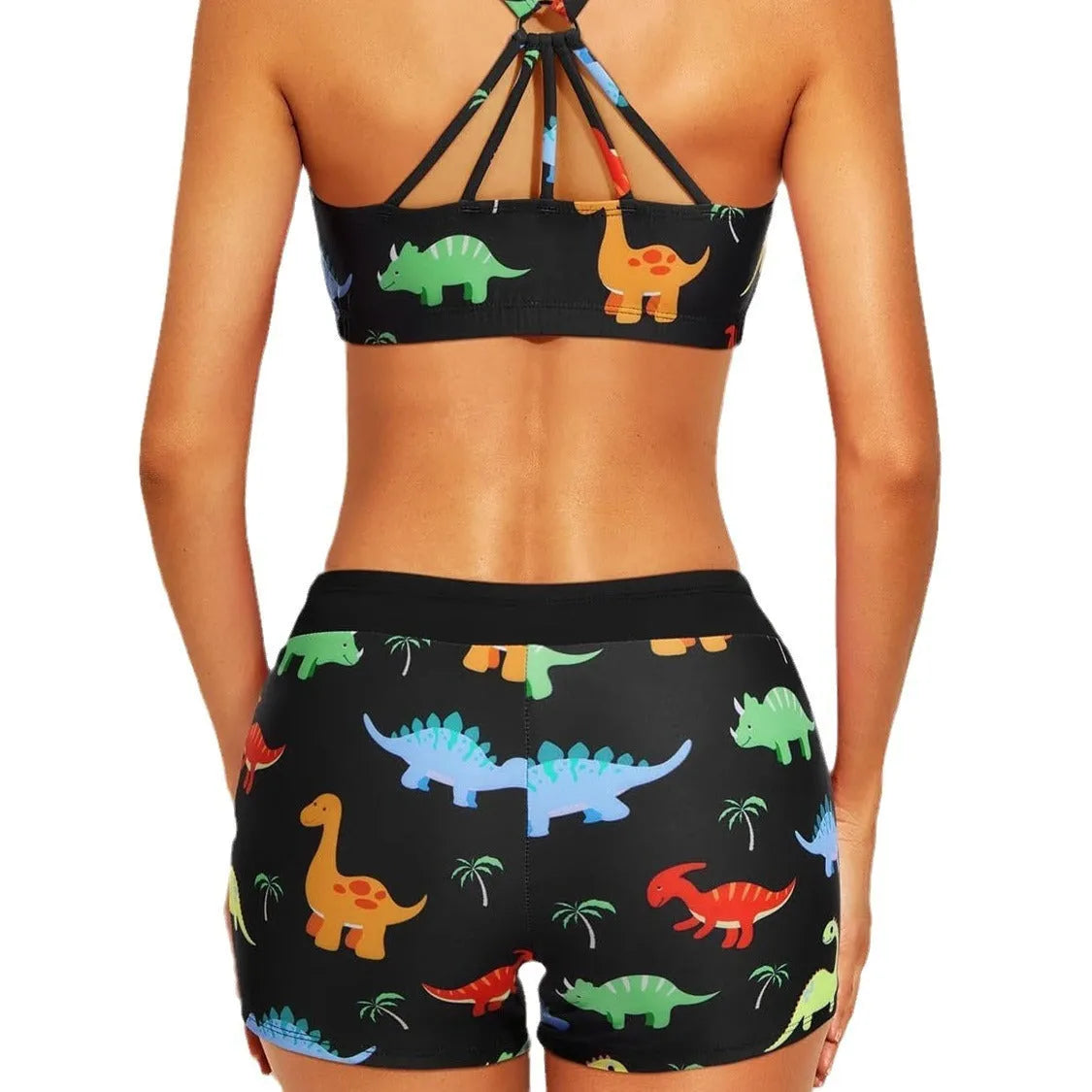 Women's printed three-piece swimsuit set with short sleeve top, vest, and shorts in peacock blue, showing hollow backless design and covered belly.