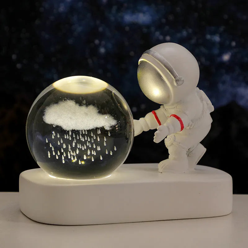 6cm crystal ball night light showing astronaut and galaxy scene inside, with USB cable