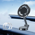 Black car phone holder with 360-degree rotation bracket mounted on dashboard