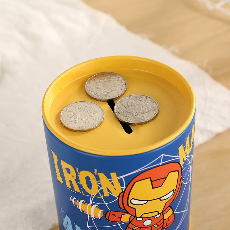 Rectangular metal piggy bank savings box with coin slot, 85mm wide by 102mm high.