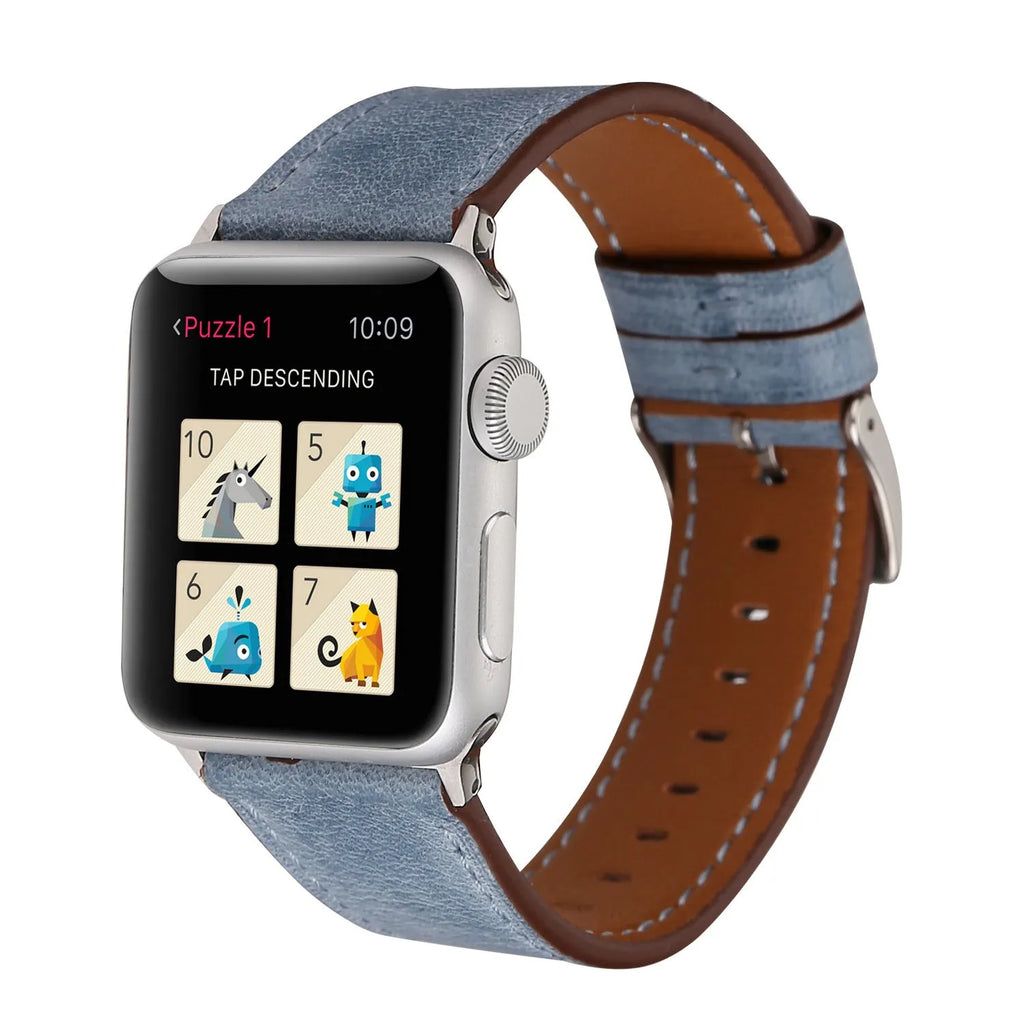 Genuine leather watch strap with a folding buckle in various colours on a grey background.