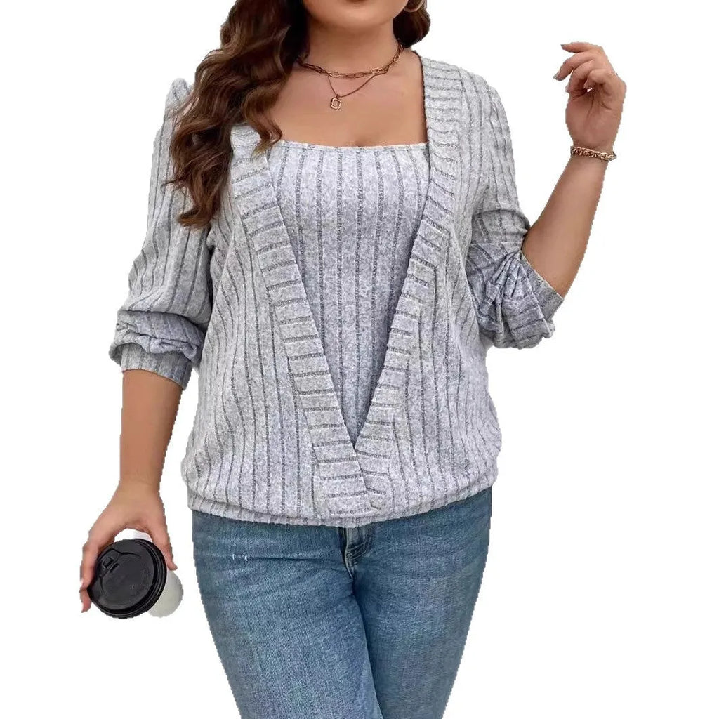 Women's loose fit long sleeve V-neck top in black ribbed polyester fabric with false two-piece suit detailing