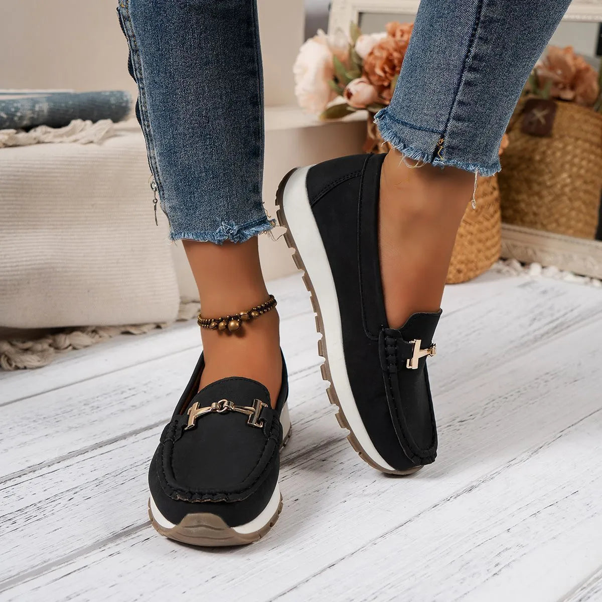 Women's non-slip PU leather loafers in beige with round toe and hollow-out side panels on a white background