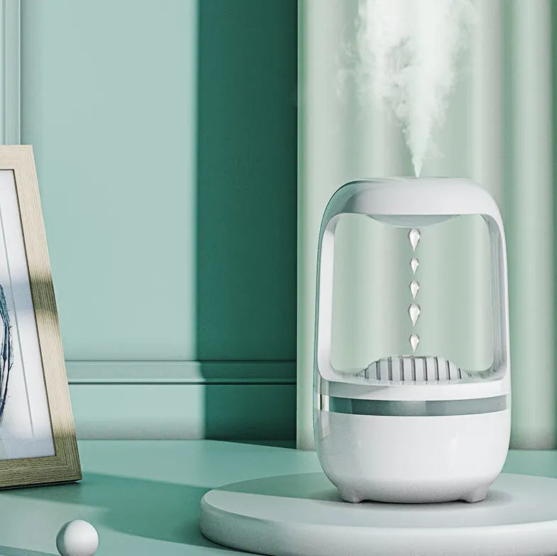 Anti-gravity humidifier with water drop backflow circulation and 500ml capacity for bedroom or office use