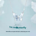 Close-up of a silver necklace with a detailed ice rain butterfly pendant on an O-ring chain.