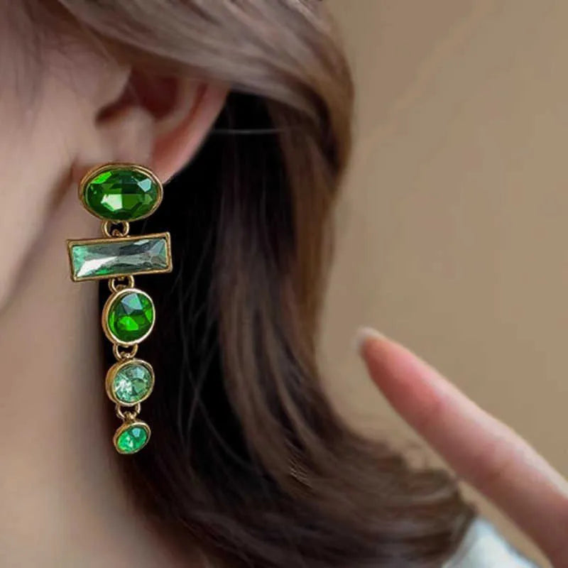 A pair of green gradient geometric earrings with an inlaid zircon stone in a Chinese style.