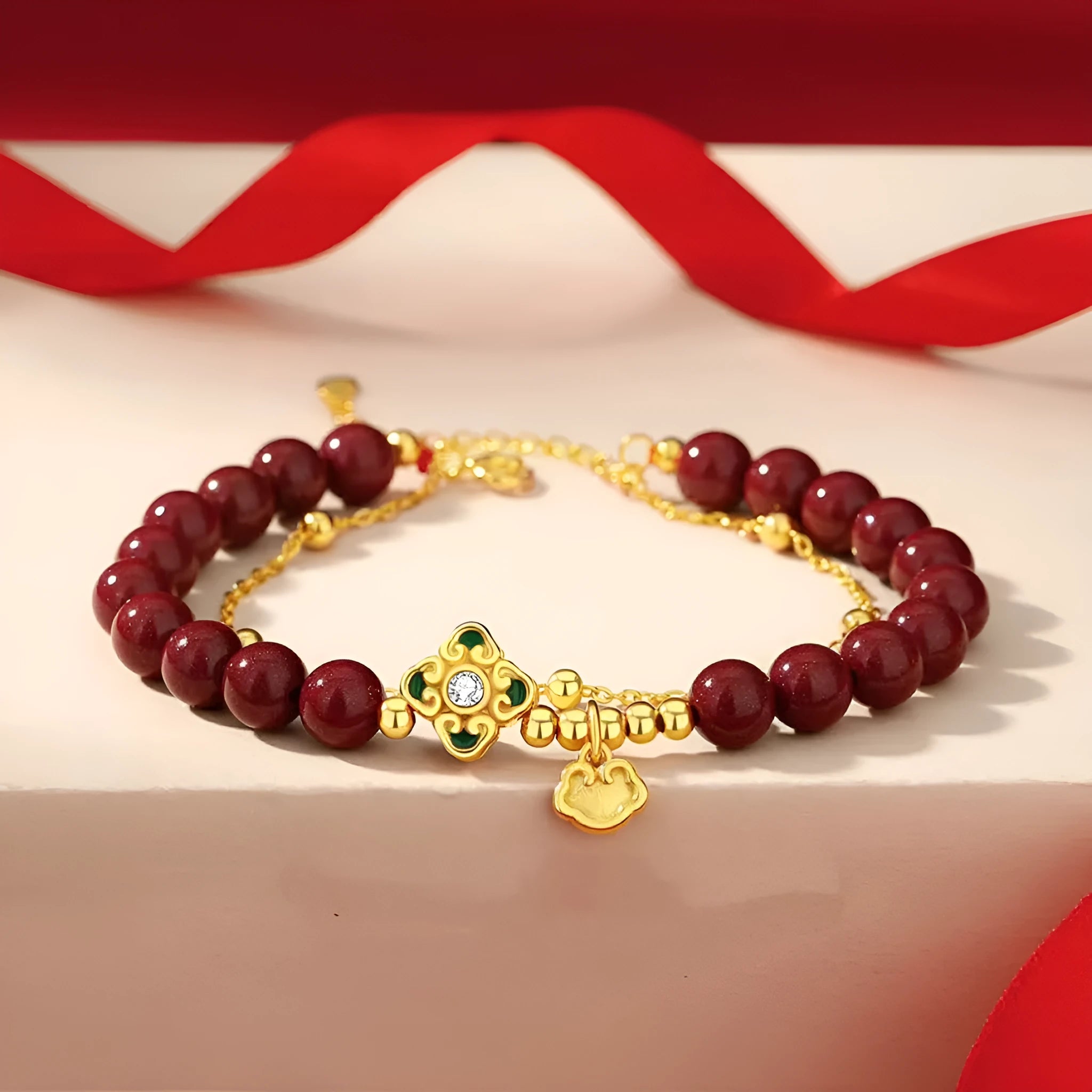Sterling silver women's bracelet with geometric design featuring Ruyi, Xiangyun motifs and cinnabar flower detail.