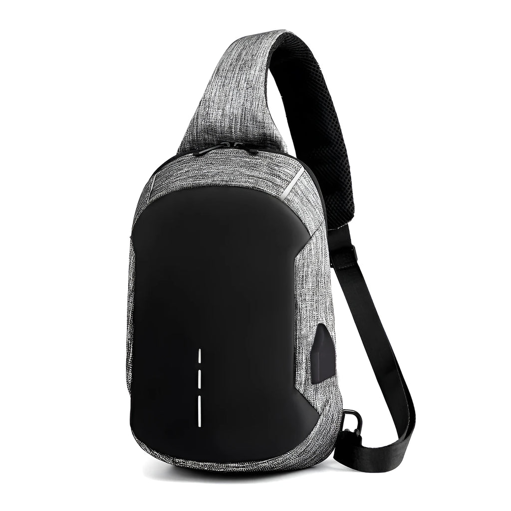 Small dark blue oxford cloth chest bag with a zipper and adjustable strap, showing internal phone pocket.