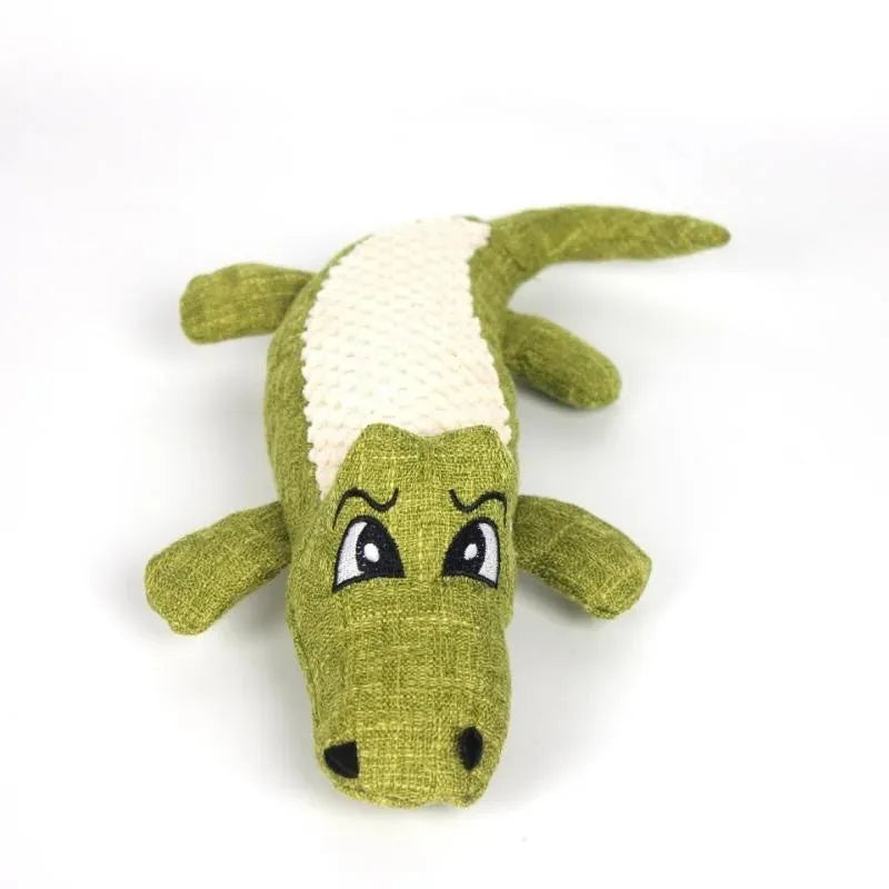 Blue, green, and red corn-shaped plush pet toys with a grid texture on a white background