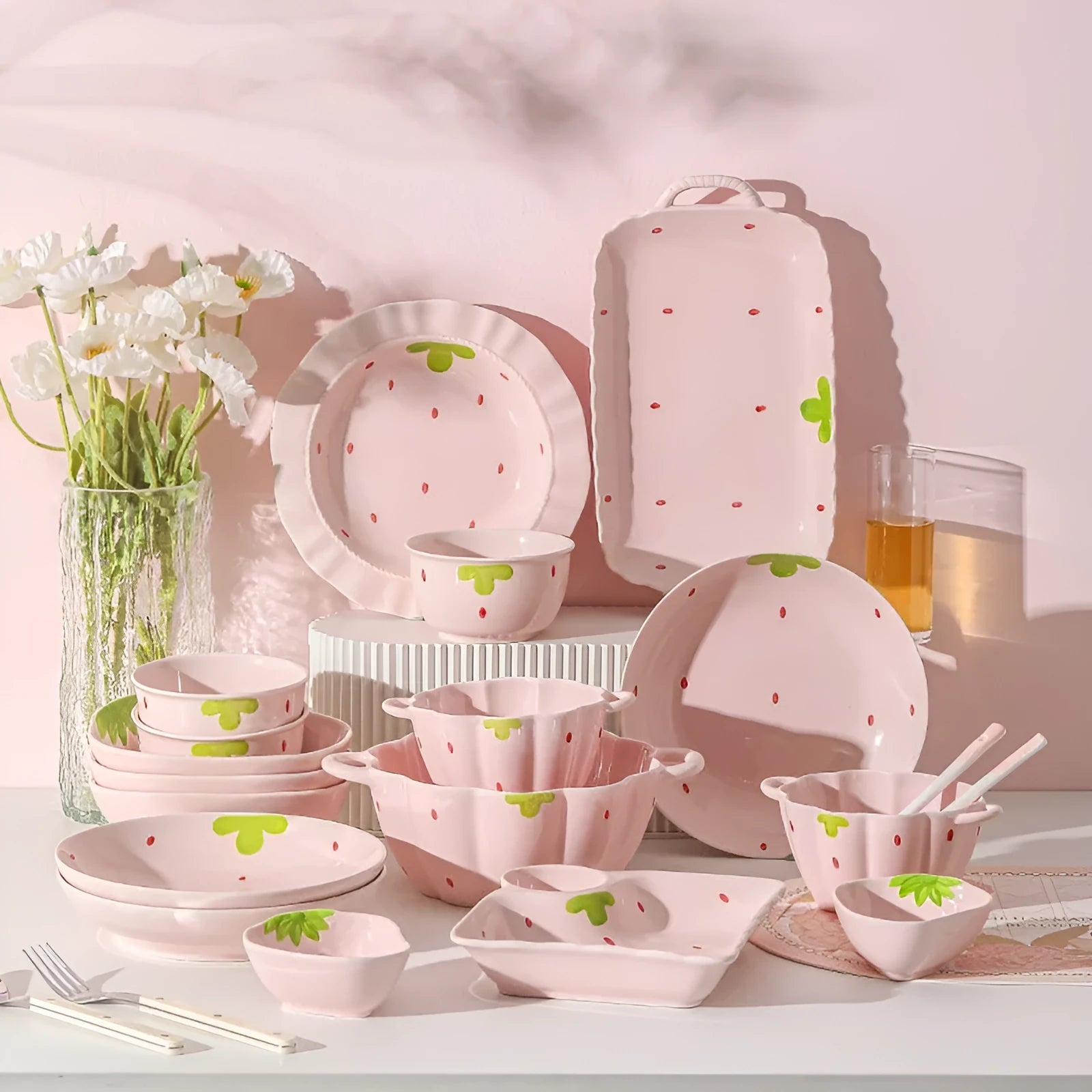 Cute strawberry-themed porcelain dinnerware set with flower bowl, fish dish, plates, and spoon.