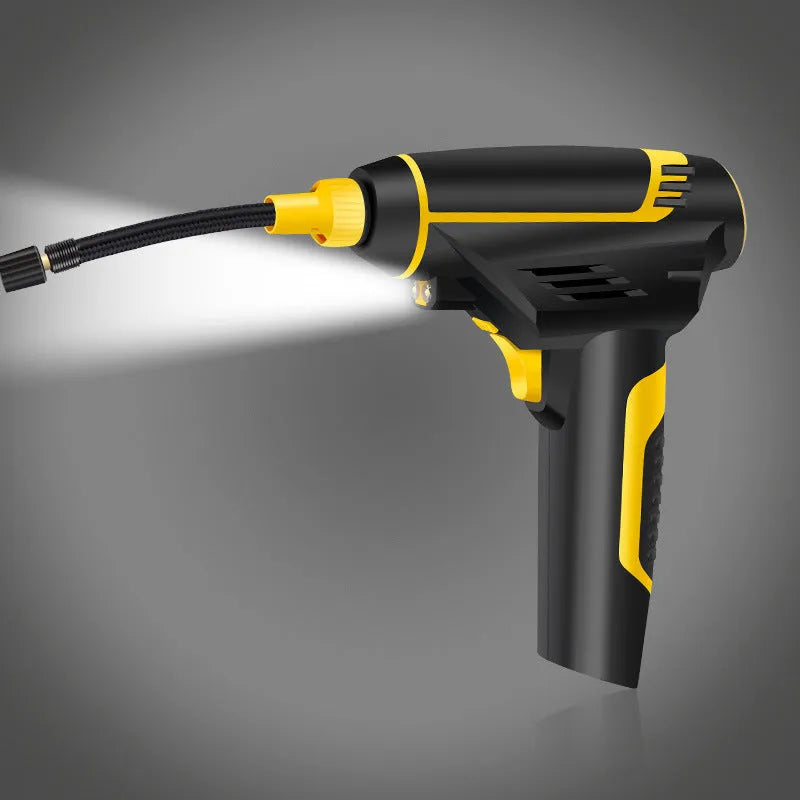 Automatic portable handheld digital LED car air compressor with hose and connectors on black background