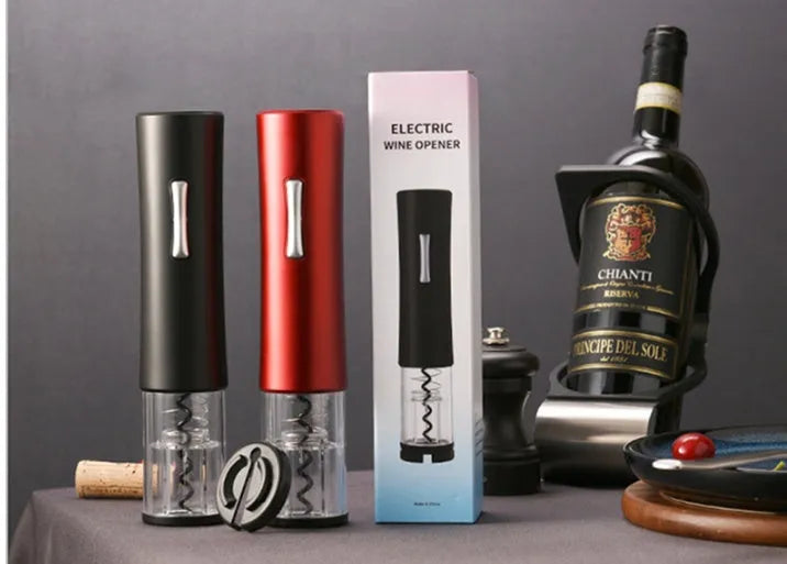 Automatic electric wine opener with black ABS shell and foil cutter set on a table alongside a wine bottle