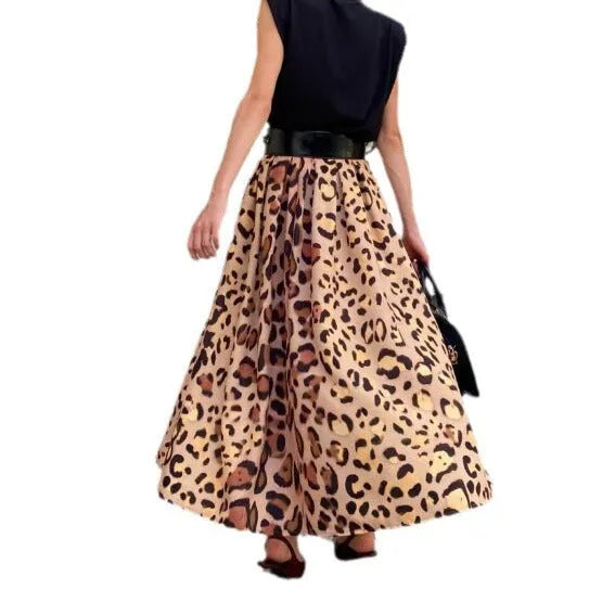 Brown leopard print women's A-line long skirt on a hanger.