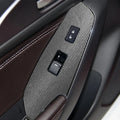 Set of four TPU protective films for car door switch panels in clear and textured black finishes.
