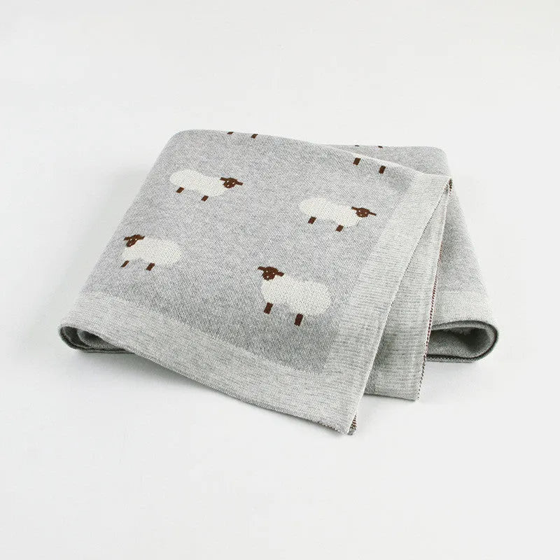 A pink 100x80 cm cotton baby blanket cover laid flat, designed to be windproof for infant cots.