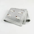 A pink 100x80 cm cotton baby blanket cover laid flat, designed to be windproof for infant cots.